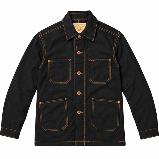 A black canvas utility jacket with orange-brown contrast stitching, orange-brown buttons, and a tan interior label, shown flat on a white background.