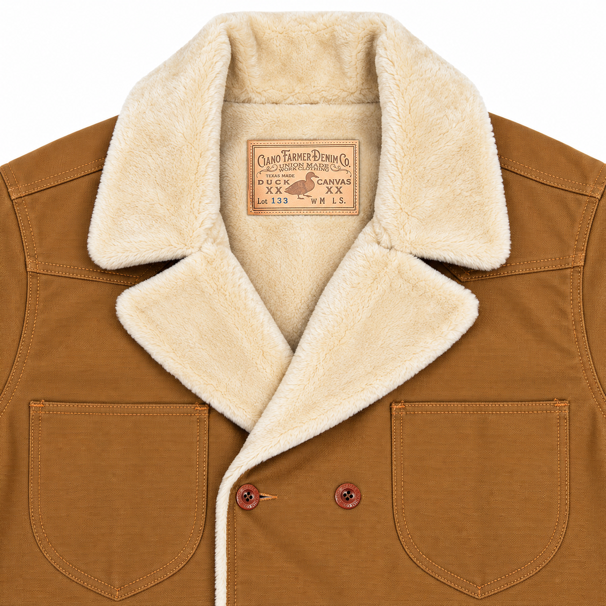 Close-up of a brown canvas work jacket with a thick cream sherpa collar and two front patch pockets, showing the brand label inside the collar.