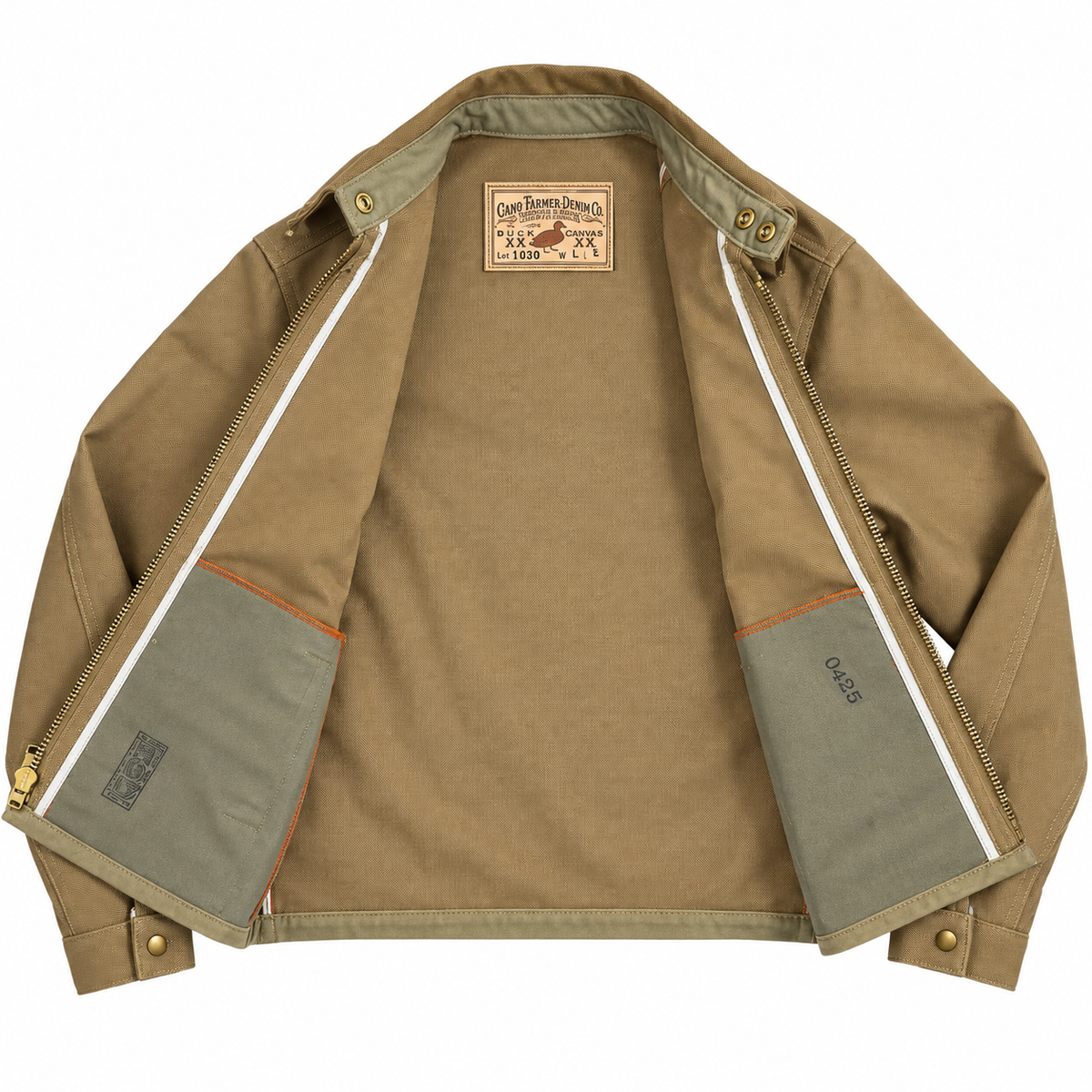 A tan canvas jacket from Carhartt WIP, shown open to display the interior. The jacket features a tan body, olive green inner pockets with white piping, and a tan brand patch on the inside collar.